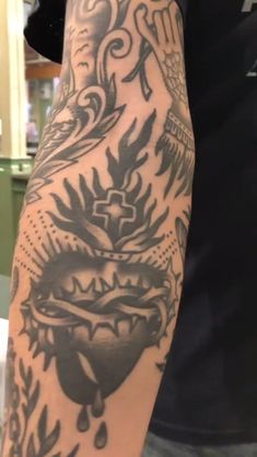 a man with a tattoo on his arm