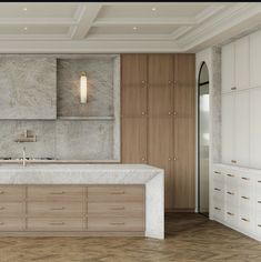 a large kitchen with marble counter tops and wooden cabinetry, along with white cupboards