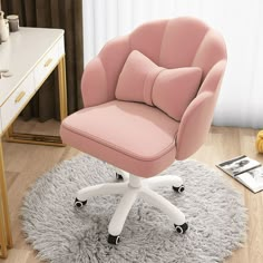 a pink office chair sitting on top of a white rug