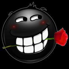 a black smiley face with a red rose in it's mouth