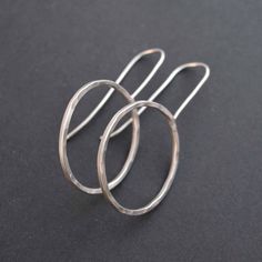 These geometric round hoop earrings are handmade and made of 925 sterling silver wire. These hoops hammered for texture and polished for high shine, a earwire is soldered at the top of each hoop which allows them to free movement. these hoops are lightweight and comfortableStuff Type: Drop And Dangle Hoop EarringsMetal : 925 Sterling silverGemstone : NAIdeal For: Men, Women, boys, Girls World Wide Free Shipping. Shipping Services USPS, UPS, DPD, and ECOM. Order Below 150 USD Will Ship Through US Tarnished Silver Jewelry, Dangle Hoop Earrings, Handmade Gifts For Her, Jewelry Model, Hammered Silver, Sterling Silver Hoops, Silver Hoops, Minimalist Earrings, Silver Hoop Earrings