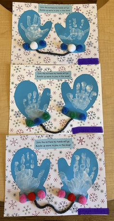 three handprints are placed on top of each other in front of a card