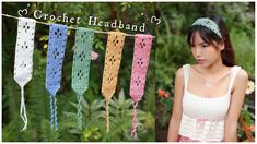 a woman standing next to a bunch of crochet headbands hanging from a line