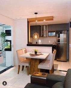 a kitchen and dining room with an open floor plan