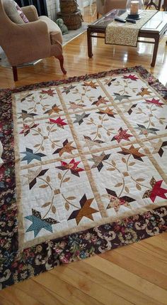 a quilted table runner on the floor in a living room