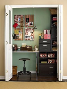 a room with a desk, chair and bookshelf in the doorway to another room