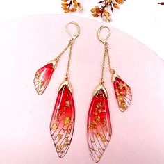 Fairy Wing Shaped Earrings Red Tinted With Gold Accents Lightweight More Colors Available All Prices Negotiable! Deep Discounts On Bundles! Other Unique Items In My Closet Come Have A Look Around _ _ _ _ _ _ _ _ _ _ _ _ _ _ _ _ _ _ _ _ _ _ _ _ _ _ _ _ _ Butterfly Fairy Tale Wing Mystical Faerie Nature Creative Spring Cottagecore Instagram Magic Tiktok Art Garden Cottage Creatures Magical Fantasy Fae Winx Trendy Story Forest Gold Naturecore Trending Adventure Meadow Selfie Princess Red Crimson Red Butterfly Jewelry, Red Butterfly Earrings For Gift, Earing Inspiration, Renfaire Outfit, Aesthetic Attire, Cottagecore Instagram, Fantasy Jewelry Magic, Spring Cottagecore, Tiktok Art