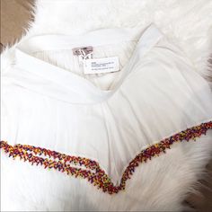 Anthropologie Muche Et Muchette White Multicolored Beaded Fringe Shorts Size Medium Nwt! Great As A Beach Swimsuit Coverup Or Worn As Part Of Your #Ootd With A Band Tee & Studded Sandals! Elastic Waist Soft Shorts. White Boho Collar Top For Beach, Chic Beaded Tops For Beach, Chic Beaded Tops For The Beach, Beaded Tops For Vacation In Spring, Beaded Tops For Spring Vacation, Spring Vacation Beaded Tops, Summer White Beaded Top, White Beaded Top For Summer, Spring Beaded Multicolor Tops