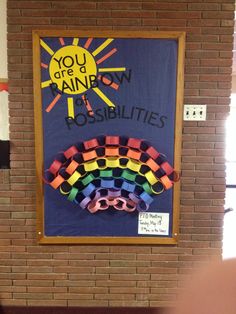 a bulletin board that has been made to look like a rainbow