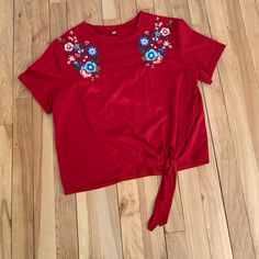 Such A Cute Tee! Red, With Round Neck, Beautifully Embroidered Flowers, Great For Summer. Never Worn! Casual Red Embroidered Top, Casual Red Tops With Floral Embroidery, Red Cotton T-shirt With Floral Embroidery, Casual Red Cotton Embroidered Top, Casual Red Embroidered Top For Summer, Red Embroidered Casual Top For Summer, Red Short Sleeve Top With Floral Embroidery, Red Floral Embroidered Crew Neck Top, Red Tops With Floral Embroidery For Spring