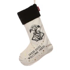 a white christmas stocking with an image of a skeleton holding a sign that says, house rules welcome home