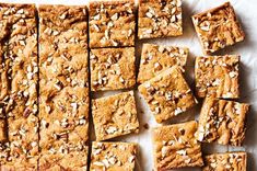 several squares of food sitting on top of a table