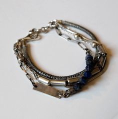 Lapis Lazuli Bracelet, Sterling Silver Bracelet, Boho Blue Bracelet, Multi Strand, Multi strand silver bracelet with Lapis Lazuli 5mm beads Silver chain has been oxidized All bracelets can be made any size, just remind me in note for seller. Please allow 4 days to create it in your size. Try to keep it away from water You will get the item in a gift box. LENGTHS: * ХS: 16 cm / 6.25 inches * S: 17 cm / 6.7 inches * M: 18.5 cm / 7.25 inches * L: 19.75 cm / 7.75 inches Silver Multi-strand Hand Wrapped Bracelets, Silver Multi-strand Spiritual Bracelets, Multi-strand Metal Bracelets As Gift, Multi-strand Metal Bracelets For Gifts, Spiritual Silver Multi-strand Bracelets, Spiritual Multi-strand Silver Bracelets, Nickel Free Multi-strand Bracelets For Jewelry Making, Nickel-free Multi-strand Bracelets For Jewelry Making, Blue Metal Bracelet With Lobster Clasp