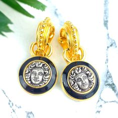 Add a touch of timeless elegance to your jewelry collection with these stunning Vintage high end Etruscan Revival Medusa Clip on Earrings. The intricate design features the iconic Medusa motif, known for its powerful and captivating allure. Perfect for adding a touch of sophistication to any outfit, these earrings are sure to be a conversation starter.  These earrings have good weight and are unsigned, made with designer quality.  Stunning Chic luxury clip on earrings measure 2 inches long X 1 i High End Jewelry, Retro Glamour, Earrings Vintage, Vintage Earrings, Clip On, Clip On Earrings, Favorite Jewelry, Timeless Elegance, Jewelry Collection