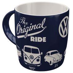 a coffee mug with the volkswagen logo and three vw vans on it's side