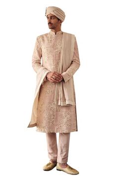 Beige sherwani with floral resham and zardosi embroidery all over. Paired with a pant and stole with crochet lace and faggoting details. - Aza Fashions Wedding Silk Sherwani For Eid, Designer Chanderi Sherwani With Traditional Drape, Wedding Sherwani In Chanderi With Straight Kurta, Wedding Straight Kurta Sherwani In Chanderi, Silk Sherwani With Traditional Drape For Diwali, Festive Silk Sherwani With Resham Embroidery, Silk Sherwani With Zari Work And Traditional Drape, Silk Sherwani With Zari Work For Eid, Eid Silk Sherwani With Zari Work