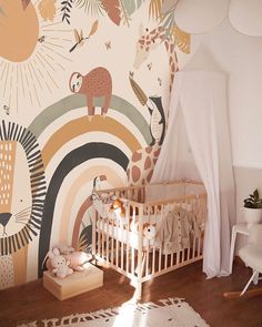 a baby's room with an animal themed wallpaper and crib in the corner