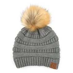 a grey hat with a brown pom - pom on the top and a white background