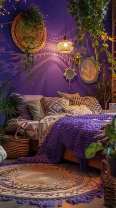 a bedroom with purple walls and lots of plants