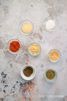 bowls filled with different types of spices