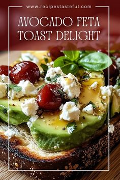 an avocado feta toast with tomatoes, cheese and basil on top is shown