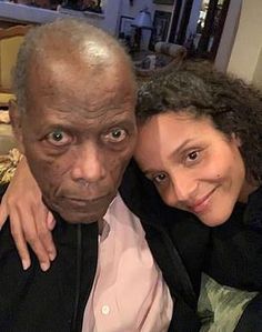 an older man and young woman posing for a photo with the caption, sidney potter today, with his daughter on his 34th birthday