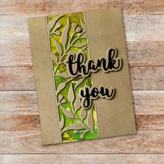 a thank you card with the words thank you written in black and green on it