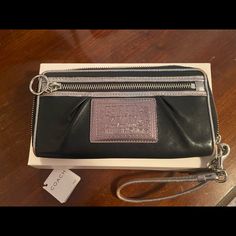 Gently Used Maybe 3/4 Times Coach Poppy Wristlet Black And Sliver Piping Coach Silver Wallets For Everyday Use, Coach Silver Wallet For Everyday Use, Silver Wristlet For Evening, Elegant Silver Wristlet For Everyday Use, Coach Poppy, Bags Coach, Coach Bags, Piping, Black Silver