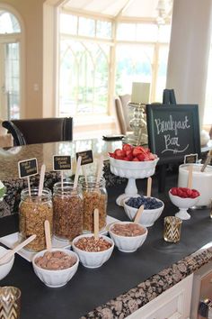 an assortment of desserts on display at a party