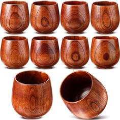 a set of twelve wooden bowls and cups