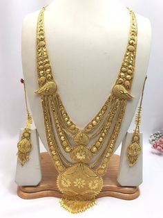 Handmade Indian Jewelry Asian Wedding Bridal Jewellery Party Ethnic Wear 22ct Gold Plated Bridal Necklace Set Rani Haar Bridal Jewellery Set  PLEASE NOTE, This Item Is Not Real Gold .Only Good Quality Gold Plated Jewellery .it is Artificial Jewellery.  It is a perfect match with formal attire on special occasions or with casual wearing.  Slight Colour variations possible due to difference in screen and photograph Care instructions Keep Jewellery away from direct heat, water, perfumes, deodorants Gold Sets With Pallu For Festivals, Gold Sets With Pallu Detail For Festivals, Gold Plated Bridal Necklace For Puja And Festivals, Gold Plated Bridal Necklace For Puja, Gold Meenakari Bridal Necklace In 22k Gold, Gold Plated Tikka For Festivals, Gold Tilla Set For Festive Occasions, Gold Tikka With Pallu For Puja, Festive Gold Sets With Tilla Details