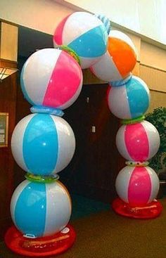 large inflatable beach balls are stacked on top of each other