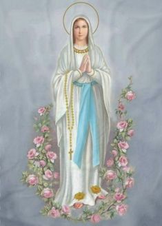 the immaculate mary statue with roses around it