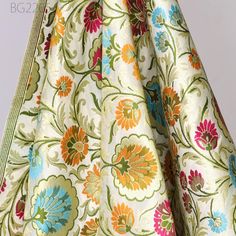 Indian Fabric Ivory Silk Brocade By The Yard Wedding Dress Fabric Banarasi Material Sewing DIY Crafting Curtain Jacket Home Decor Furnishing. This is a beautiful multi color banarasi pure silk brocade in floral design fabric in multi color (Ivory with Magenta, Yellow, Turquoise Blue, Olive Green) and Gold.  ➤Product: Brocade Fabric ➤Fabric Type: Blended Silk (Viscose + Rayon and 30% Silk) Fine Quality Zari Brocade Weaving from Banaras ➤Color: Base color is Ivory with Magenta, Yellow, Turquoise Blue, Olive Green and Gold. ➤Width: 35 inches. ➤Condition: New  ➤Code: bg2205 ➤Listing for 1 Yard of fabric. ➤Care: Dry Clean Only You can use this fabric to make Dresses, Tops, Blouses, Jackets, Crafting, Clutches or Evening Bags, Embellish your clothes, Pillows, Drapery, Home Décor, Outdoor, Quilti Floral Embroidered Jacquard Fabric For Wedding, Wedding Jacquard Dupatta With Pallu, White Brocade Dupatta, Wedding Dress Fabric, Yard Wedding, Wedding Dress Fabrics, Etsy Wedding Dress, Indian Fabric, Sewing Diy