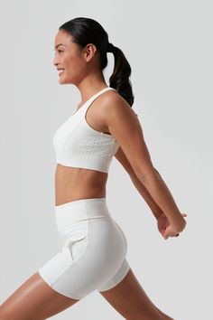 Tnuck Sport combines technical fabrics with stylish silhouettes to move with you as you play all day. From morning coffee runs to marathons, these pieces were designed with busy lifestyles in mind and are as functional as they are chic.Long enough to wear solo with the matching tennis short or but streamlined enough to wear under a sport dress, this cane detailed bra was designed for support and comfort without compromising style and shape. Featuring a power mesh interior with compression and wi Compressive Breathable Sports Bra For Light Sports, Compressive Sports Bra With Mesh Back For Gym, Compressive Mesh Back Sports Bra For Gym, Mesh Sports Bra With Built-in Padding For Yoga, Sporty High Stretch Sports Bra With Breathable Mesh, Breathable Mesh Sportswear Sports Bra, Breathable Mesh Stretch Sports Bra For Running, Breathable Supportive Activewear For Light Sports, Breathable Mesh Sports Bra For Light Sports