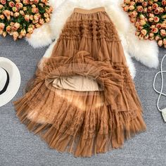 Material:tulle Color:khaki,apricot,white,black Style:stylish Features:pleated,irregular Size(CM):free 1inch=2.54cm length:90,waist:62-82 All items will arrive in 20-25 business days, if you have an emergency, please contact us to upgrade logistics. Need to add 15 dollars fast shipping(Arrive in 10-14 days).