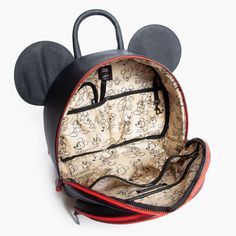 Details Pack up the magic today with our Disney Baby x FP Mickey Anaheim Backpack! This one of kind backpack is perfect for storing all the essentials for mom and baby. Disney Mickey's iconic ears are featured front and center, with small details this is a must-have for any Disney lover. With a spacious main compartment, front pocket, and 6 interior pockets, you can store everything you need for any adventure! Shop the entire Disney Baby x FP Collection here. Features Vegan saffiano leather 100% Disney Mickey Mouse Backpack For Travel, Disney Backpack For Back To School, Disney Backpack With Zipper Closure For Daily Use, Disney Backpack For Daily Use And Back To School, Disney Mickey Mouse Backpack, Disney Backpack With Case For School, Disney Mickey Mouse Standard Backpack, Disney Backpack For School With Case Included, Disney Backpack With Adjustable Strap