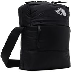 Water-resistant insulated nylon ripstop shoulder bag in black. · Adjustable webbing shoulder strap · Logo embroidered at face · Zip pocket at face · Two-way zip closure · Patch pocket and zip pocket at interior · Full canvas lining · H10.5 x W9 x D3 in Supplier color: Tnf black Black North Face, Logo Embroidered, Patch Pocket, North Face, The North Face, Zip Pockets, Shoulder Strap, Water Resistant, Women Wear