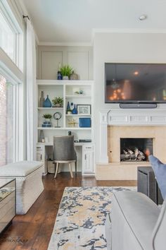 the living room is clean and ready to be used as a home office or family room