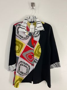 Elevate your style with our Contemporary Multi Color Blouse. The breathable fabric and abstract, contemporary design will keep you comfortable while turning heads. The red, yellow, white, and black shapes add a unique touch, while the stylish collar and sleeves complete the look. Stand out from the crowd in this must-have piece! Care: Machine wash cold Hang dry Cool iron if needed Black Shapes, Color Blouse, Multi Color Blouse, Scarf Hat, Dress With Cardigan, Stand Out From The Crowd, Skirt Pants, Sweater Skirt, Wearable Art