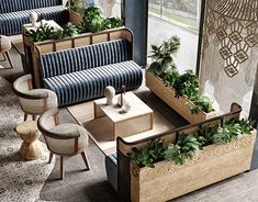 a living room filled with lots of furniture next to a window covered in plants and potted plants