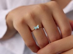 🌟 14K Gold Butterfly Ring 🌟 Meet your new favorite piece: our 14K Gold Butterfly Ring. This ring is not just a charming accessory; it's a symbol of transformation, grace, and the beauty of life's journey. The butterfly design captures the essence of freedom and the delicate balance between strength and elegance. Wear this ring as a reminder to embrace change with grace and to find beauty in every moment. 🦋 Choose your favorite color with our beautiful butterfly ring, available in two stunning Dainty 14k Yellow Gold Butterfly Ring, 14k Yellow Gold Dainty Butterfly Ring, 14k Rose Gold Butterfly Ring As Gift, Dainty Yellow Gold Butterfly Ring, 14k Gold Butterfly Ring Fine Jewelry, 14k Gold Round Butterfly Ring Fine Jewelry, 14k Yellow Gold Butterfly Ring Perfect For Gift, Delicate Yellow Gold Butterfly Ring For Gift, Gift Butterfly Ring In 14k Yellow Gold