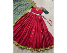 Red Chaniya Choli For Navratri PureCotton Lehenga Traditional Outfit garba Lehenga Full Stitched Gamthi Mirror work navratri lehenga Skirt Unveil Navratri Elegance with Pure Cotton Lehenga and Blouse, Featuring Tussar Silk Foiled Patola Print Dupatta Lehenga (Stitched) Lehenga Fabric : Pure Cotton Lehenga Work : Plain With Original Mirror Gamthi Work Lace Border And Gota Patti Touch Up Lehenga Waist : Support Up To 42  Lehenga Closer : Drawstring With Zip Stitching : Stitched With Canvas And Ful Traditional Semi-stitched Skirt Set For Party, Traditional Skirt Set For Eid Party, Floor-length Sets For Traditional Ceremonies And Festivals, Floor-length Sets For Traditional Ceremonies, Festive Skirt Set For Eid With Traditional Drape, Festive Traditional Drape Skirt Set For Eid, Fitted Pallu Dress For Festival, Floor-length Cotton Sets For Navratri, Traditional Cotton Party Dress