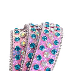 The pink strap with red and blue shiny rhinestone belt is a stunning and bold accessory that can instantly transform any outfit The belt features a bright pink strap that is made of high-quality material, which is durable and comfortable to wear. The strap is embellished with shiny red and blue rhinestones, which are carefully placed to create an intricate pattern that catches the light beautifully. The rhinestones are of different sizes and shapes, adding depth and texture to the belt, which ma Belt Store, Bling Belts, Country Music Concerts, Bold Accessories, Rhinestone Belt, Music Concert, Blue Rhinestones, Luxury Vintage, Sparkle Diamonds