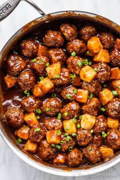 pineapple meatballs in a skillet with text overlay