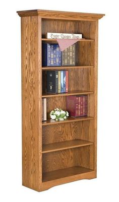 Ready to fit in right where you need it, the Amish Woodville Bookcase offers storage and display for books and more. This solid wood bookcase is ideal for your office furniture collection, but makes a great addition to the hallway, family room or bedroom as well. This solid wood bookcase helps to organize wherever you need it. Whether it's office items and manuals, children's toys, a library of books or your precious photo albums with some framed shots displayed as well, an Amish made bookcase is just the right custom furniture to provide a lovely showcase. Offering six shelves and a lovely display top, this is Woodville style furniture through and through. The design is simple and functional and blends well with contemporary or traditional décor. Browse more of our popular Woodville style Wooden Bookshelves, Furniture Construction, Oak Bookcase, Face Frame, Office Bookcase, Solid Wood Shelves, Wide Face, Wood Bookcase, Amish Furniture