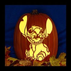 a carved pumpkin with an image of stitchy on it's face and eyes