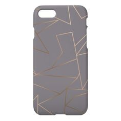 a gray phone case with gold lines on it