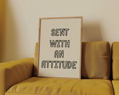 a sign that says, sent with an attitude