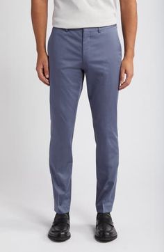 Part of your casual-day uniform, these chinos feature a slim, modern cut of stretch cotton for a comfortable fit. 31" inseam; 13" leg opening Zip fly with hook-and-bar closure Front slant pockets; back welt pockets 97% cotton, 3% elastane Dry clean Imported Fitted Cotton Bottoms For Business Casual, Fitted Chinos For Spring Business Wear, Slim Fit Straight Cotton Dress Pants, Fitted Chino Cotton Twill Chinos For Spring, Fitted Flat Front Cotton Dress Pants, Fitted Cotton Flat Front Dress Pants, Fitted Cotton Bottoms With Straight Hem, Slim Fit Cotton Dress Pants With Tapered Leg, Fitted Straight Leg Chinos With Welt Pockets